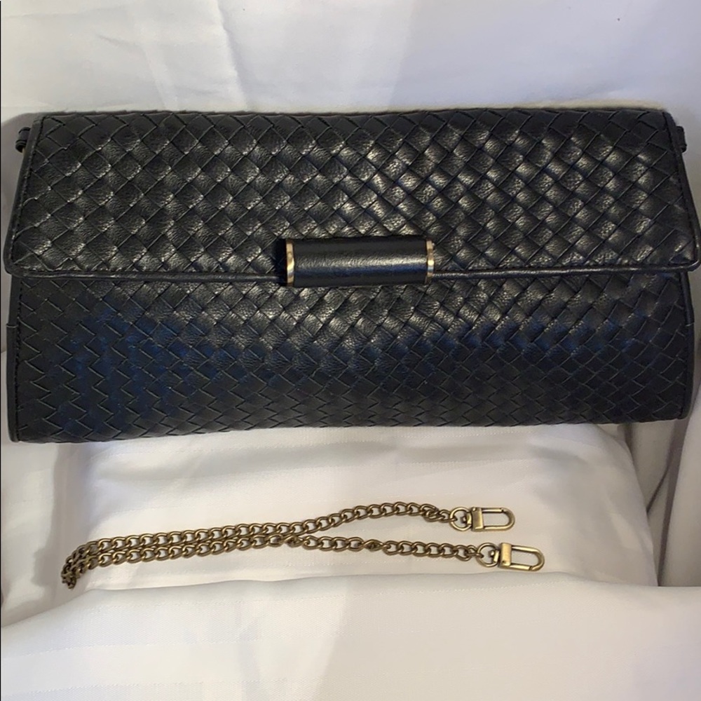 BCBG Evening all leather clutch .